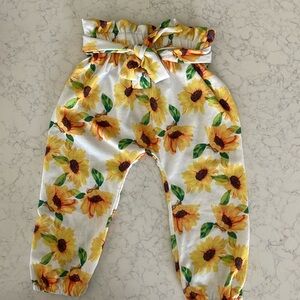 TODDLER GIRL. 12 MONTHS. STRETCHY sunflower pants with tie for sizing